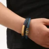 Brazalete de cuero y acero para hombre