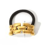 Goma de Pelo Eslabón Dorado